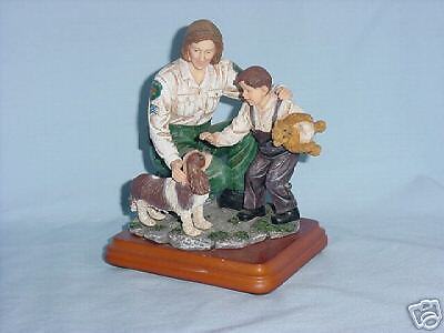 Vanmark Comforting Distraction Sheriff Deputy Figurine  